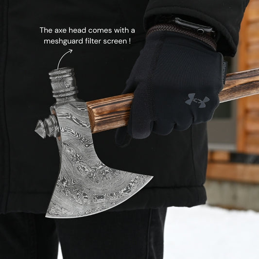 Person holding a decorative axe with text about a meshguard filter screen.