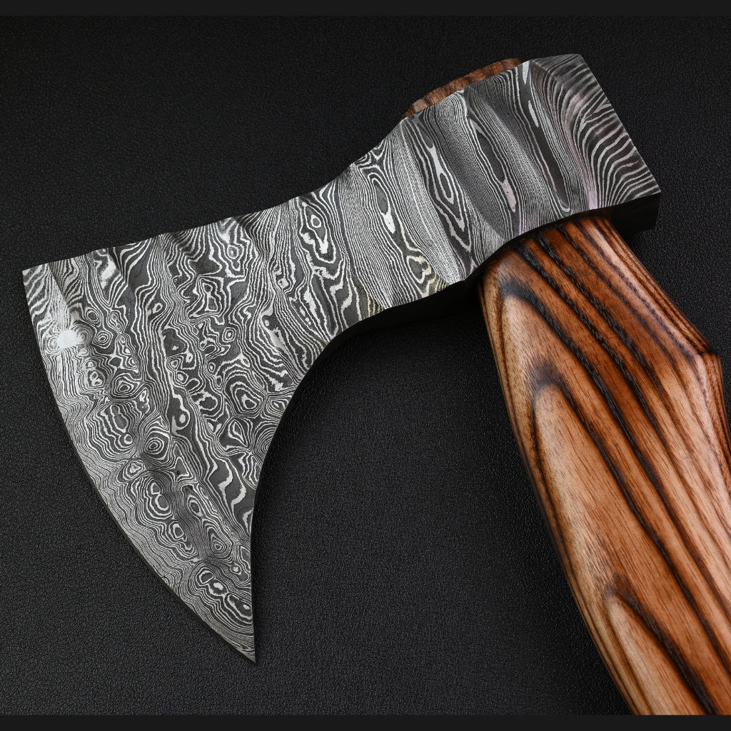 Decorative axe with a wooden handle on a black background