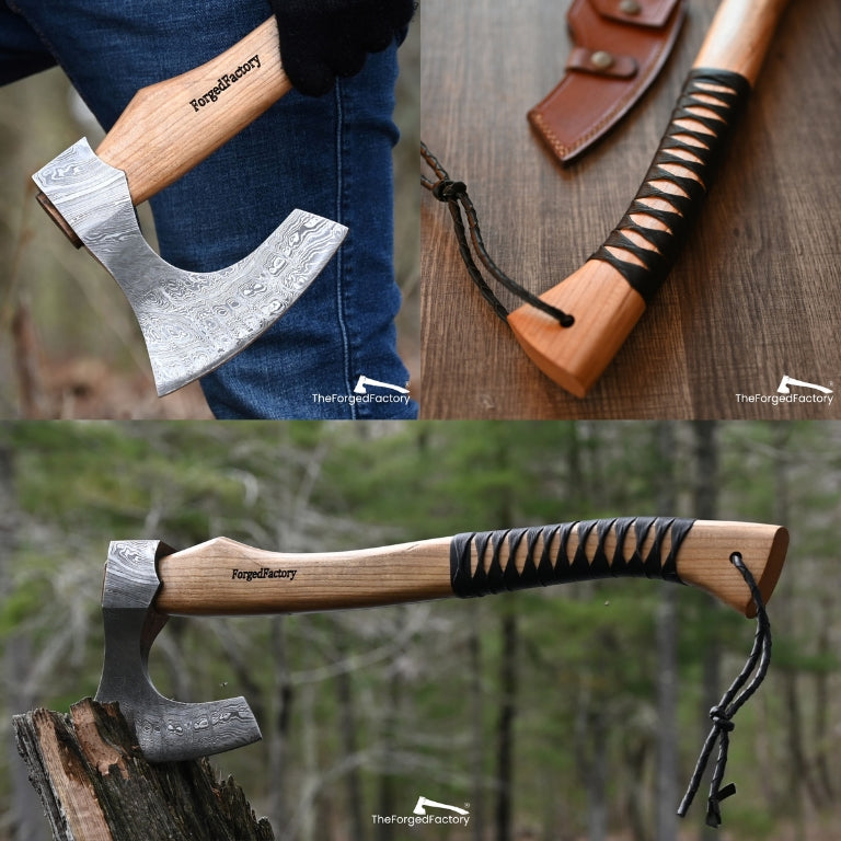 Two bushcraft axes with wooden handles and leather straps, one on a blurred natural background, the other on a wooden surface.