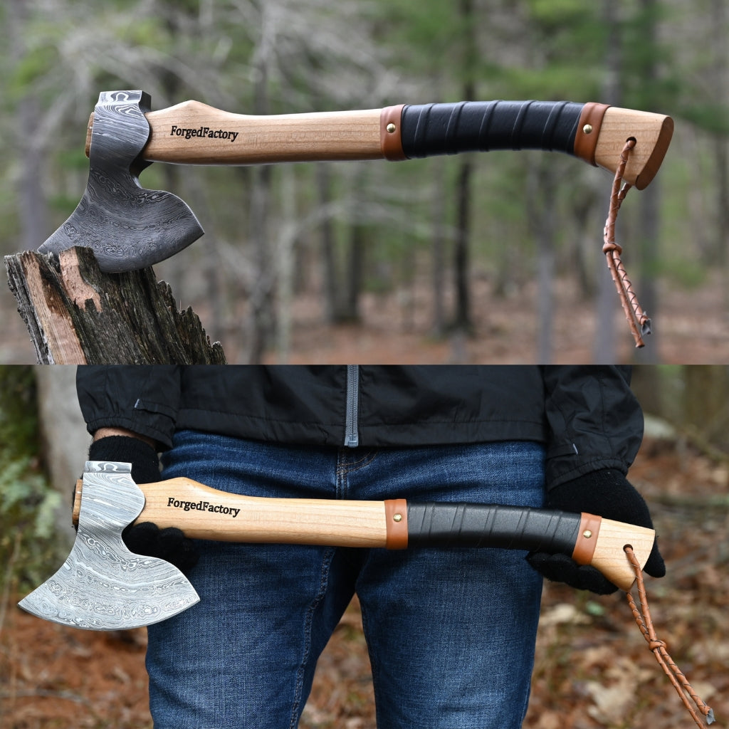 Axes with wooden handles and leather straps, one on a log, the other held by a person in a forest setting.