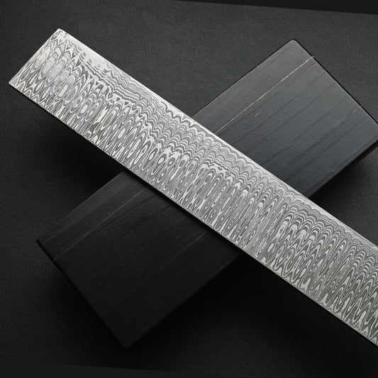 Metal file with textured surface on a black background