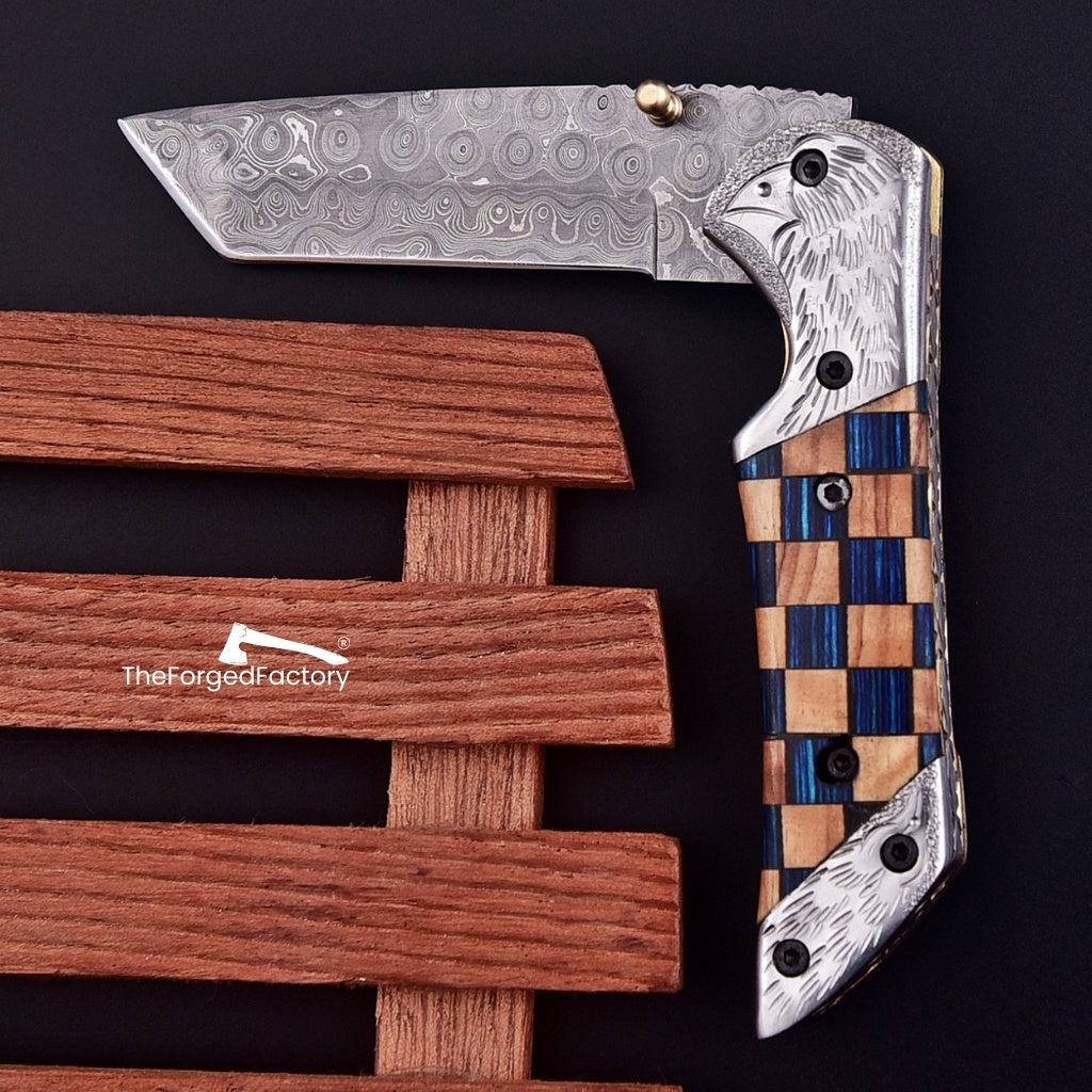 7.5-inch damascus steel folding pocket tanto knife with pakka wood handle on black background