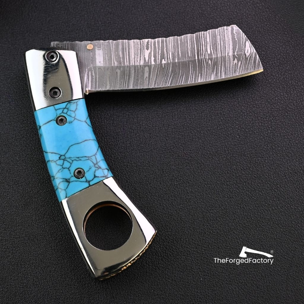 7.5-inch damascus steel folding pocket cigar cutter knife with turquoise blue handle on black background  