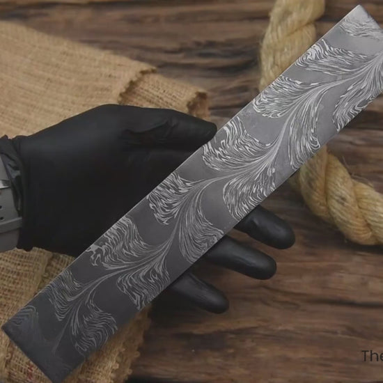 Rotating video of advanced snake pattern Damascus steel billet blank for handmade knives and forged blade crafting.