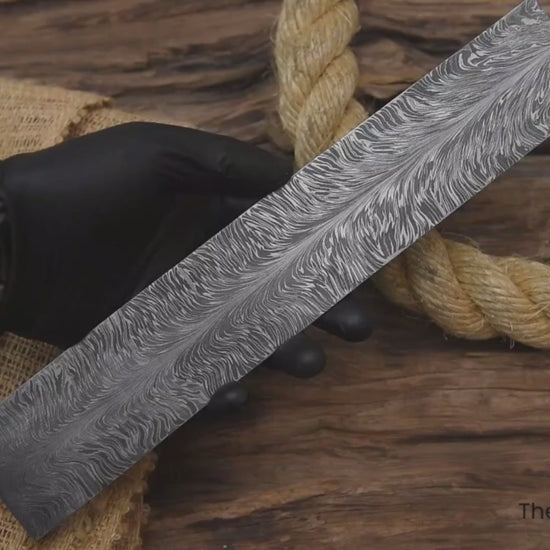 Multi-angle video of 12-inch feather pattern Damascus steel billet bar for knife making and custom bladesmith projects.